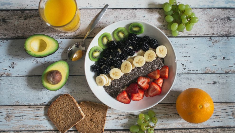 health breakfast with avocado, berries, banana