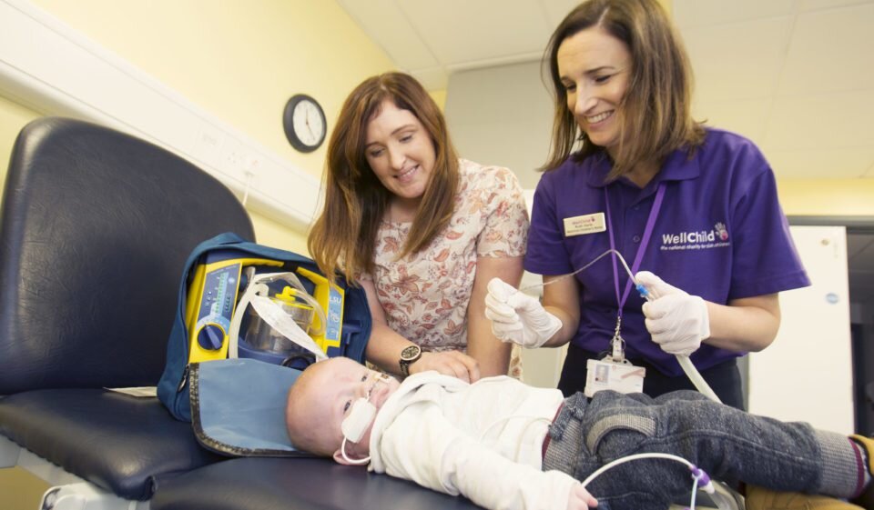 Belfast WellChild Nurse with family