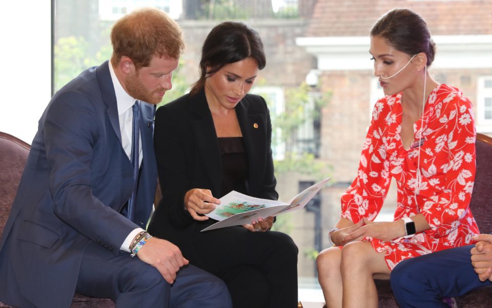 The Duke and Duchess of Sussex with WellChild Award winner Evie