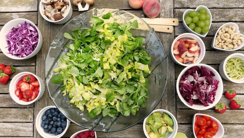 Salad and fruit on a table