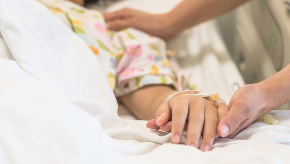 child in hospital bed