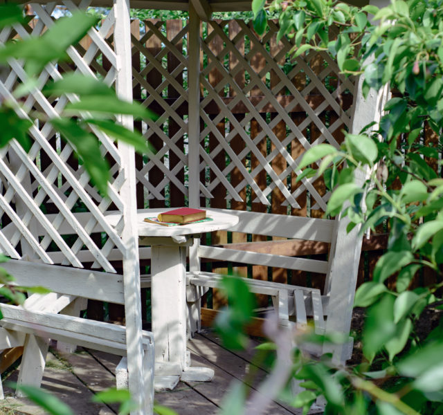 pergola with seating and trellis