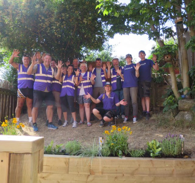 St James's place volunteering on a helping hands garden makeover