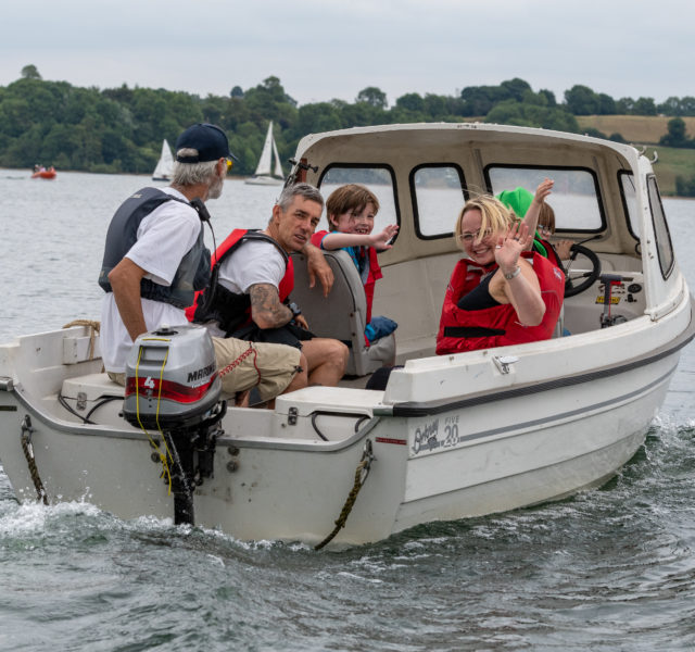 A WellChild Family Tree family on an accessible boat at Sailability