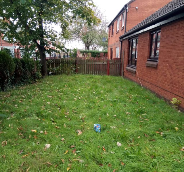 Inaccessible garden before WellChild complete the makeover