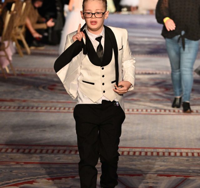 Finley walking the catwalk at The Icon event