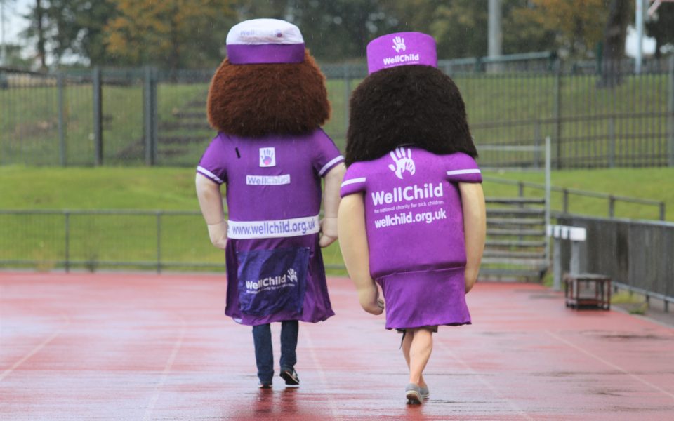 Photo of Nessa and Nina mascots running away