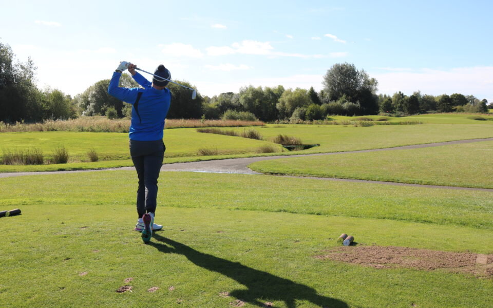 Mark Foster playing golf