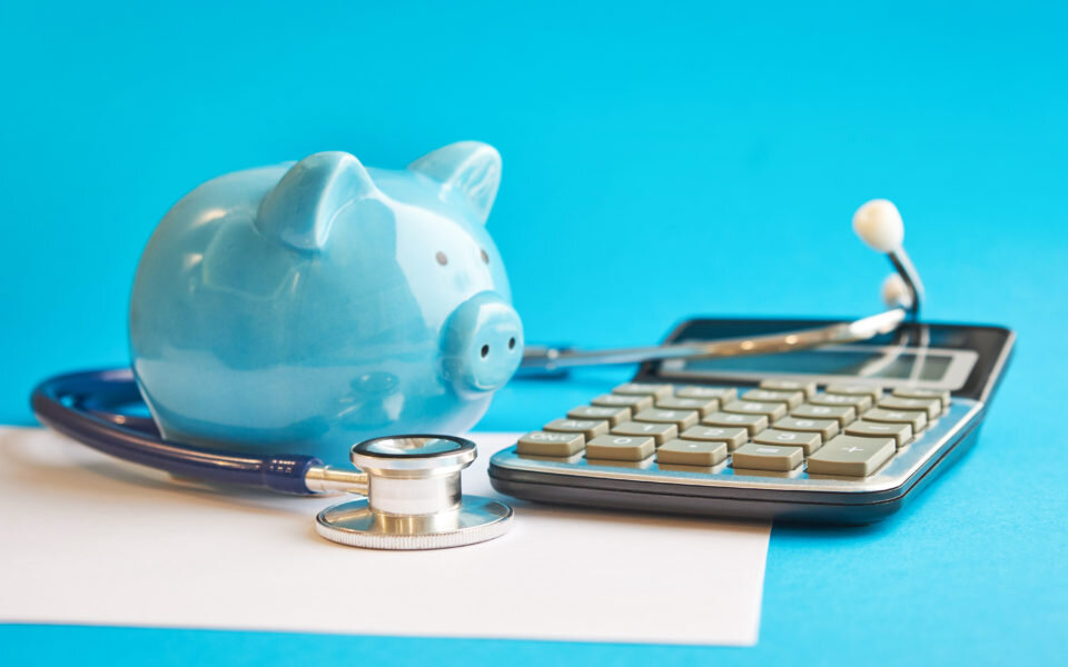Piggy bank, stethoscope, calculator, PHB, personal health budget