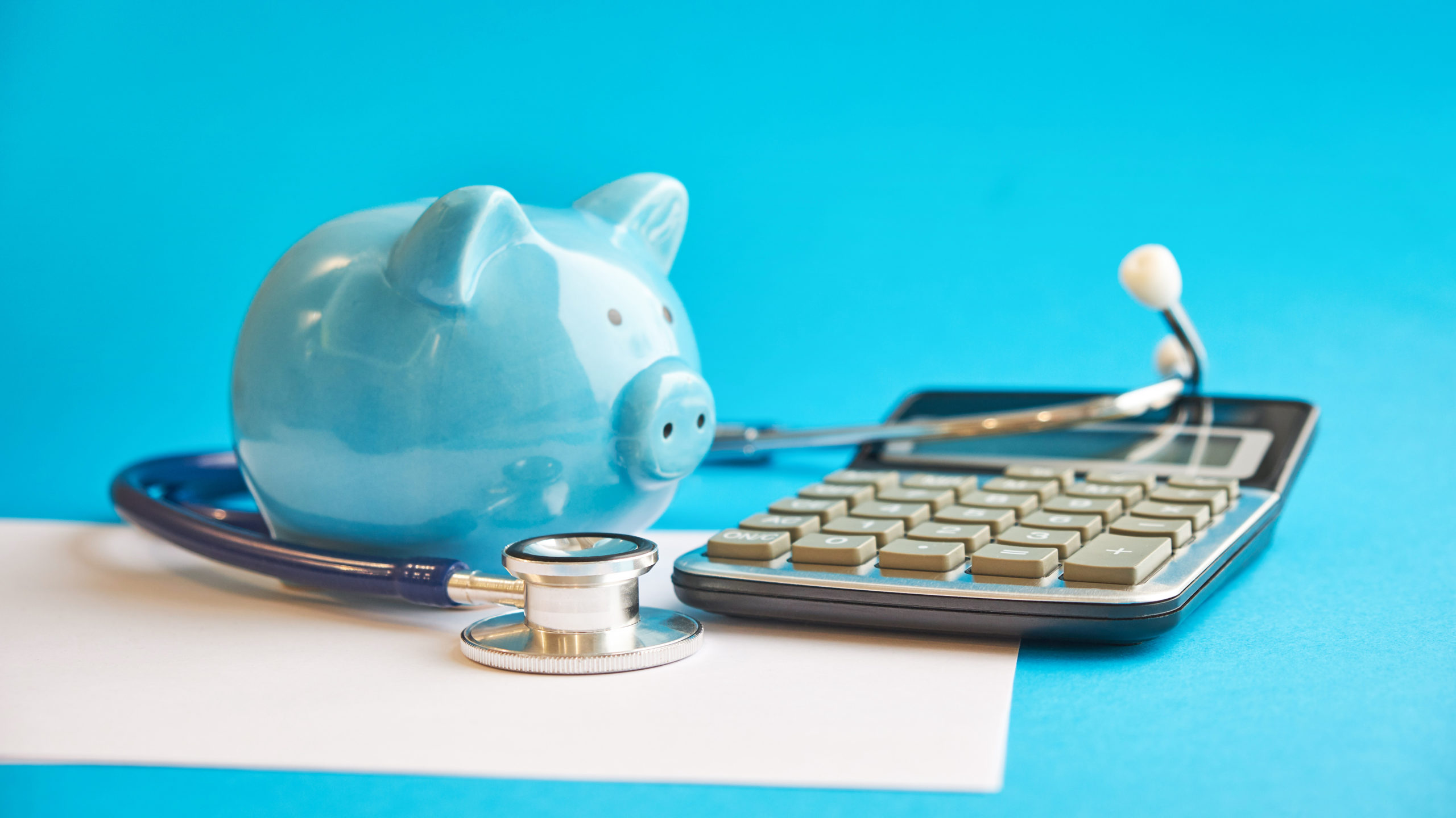 Piggy bank, stethoscope, calculator, PHB, personal health budget