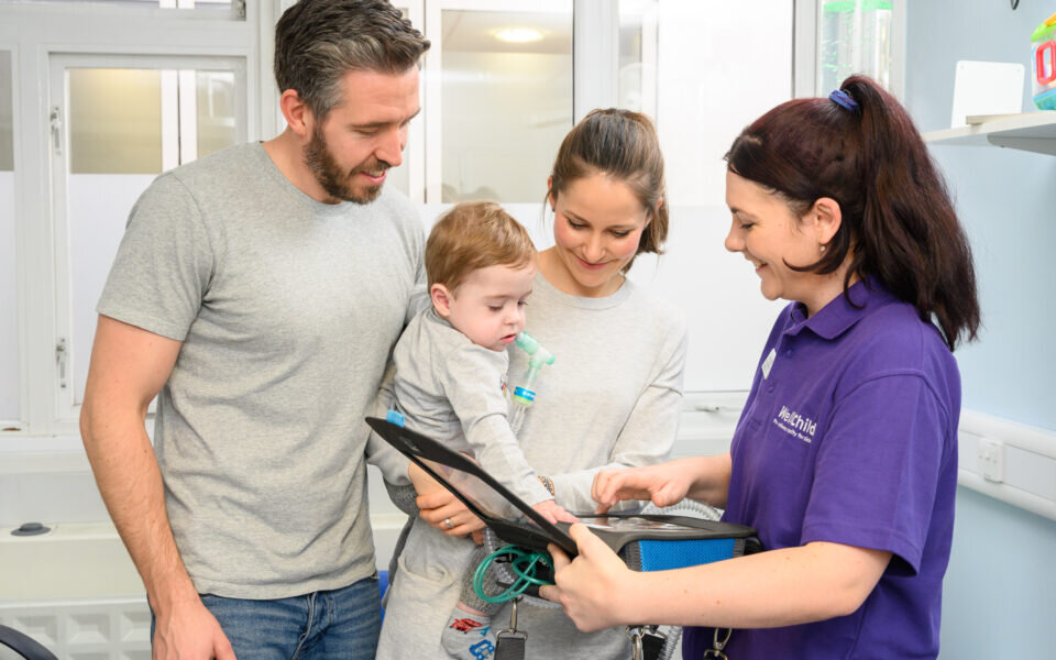 Family interacting with WellChild Nurse