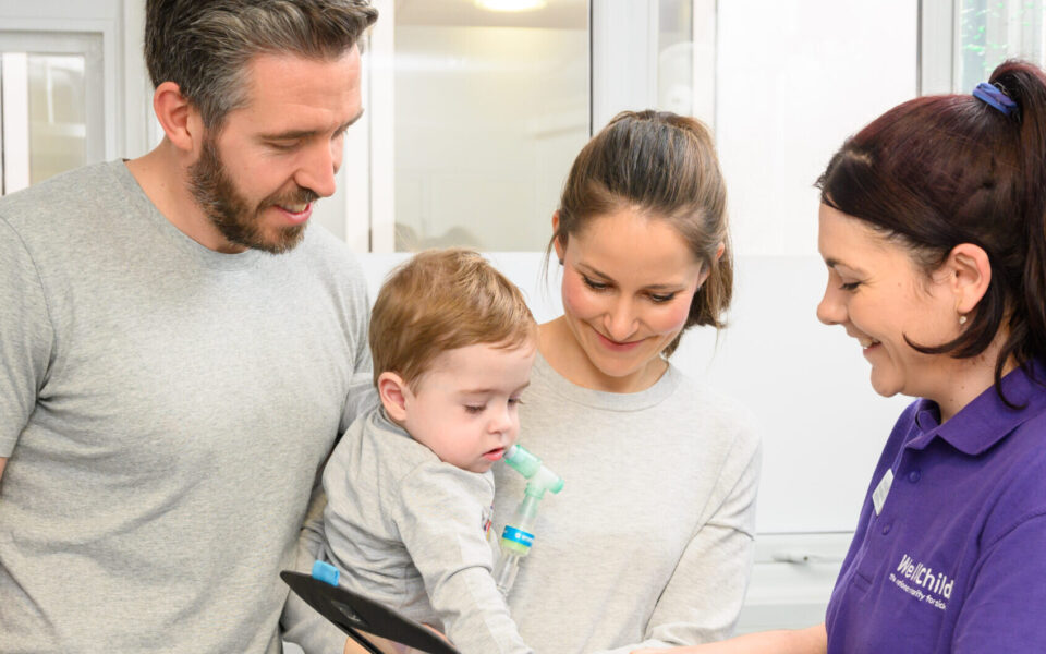 Family interacting with WellChild Nurse