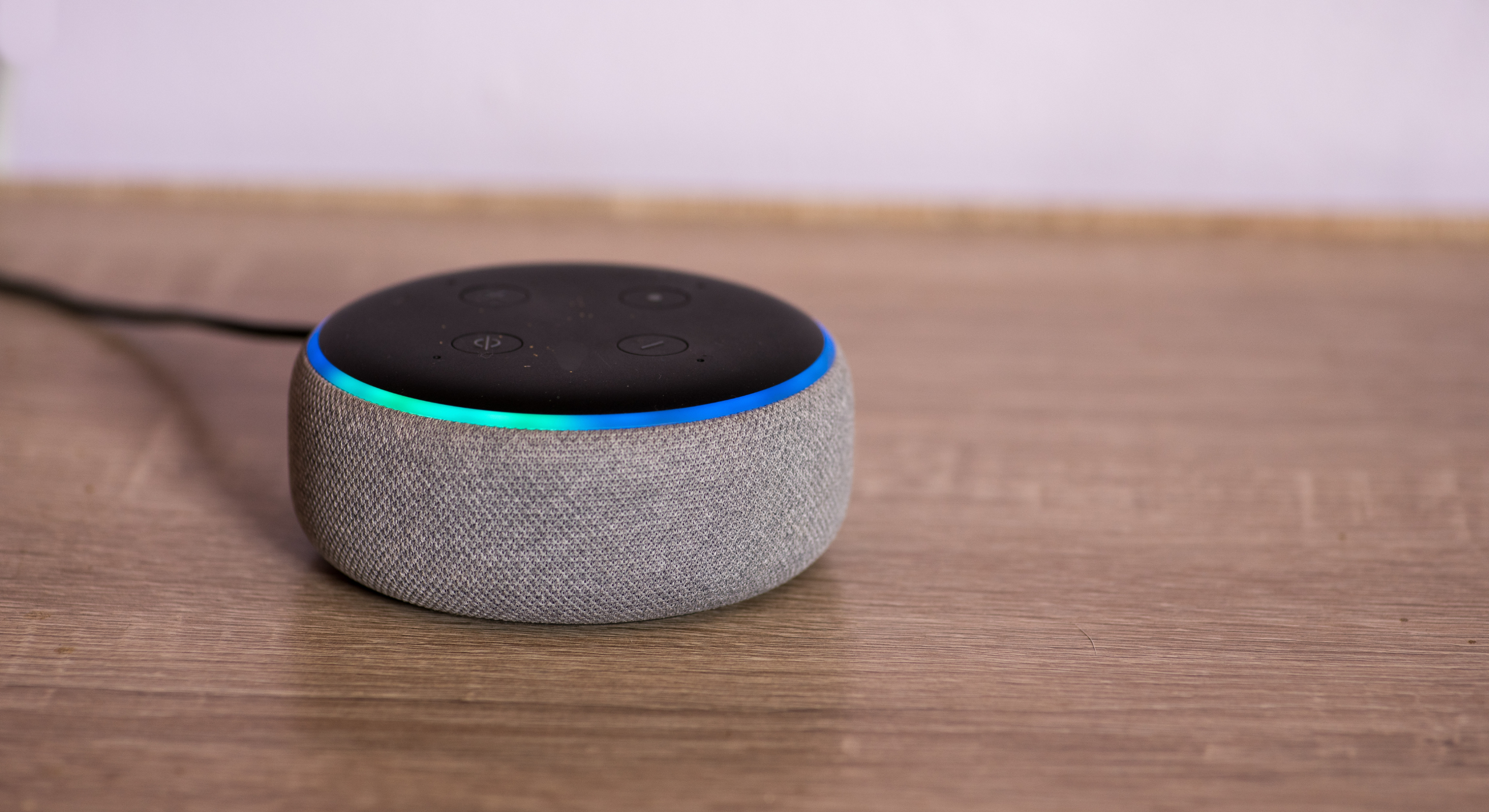 Voice assistant on a wooden table